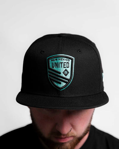 Turquoise Shield NE Snapback Hat