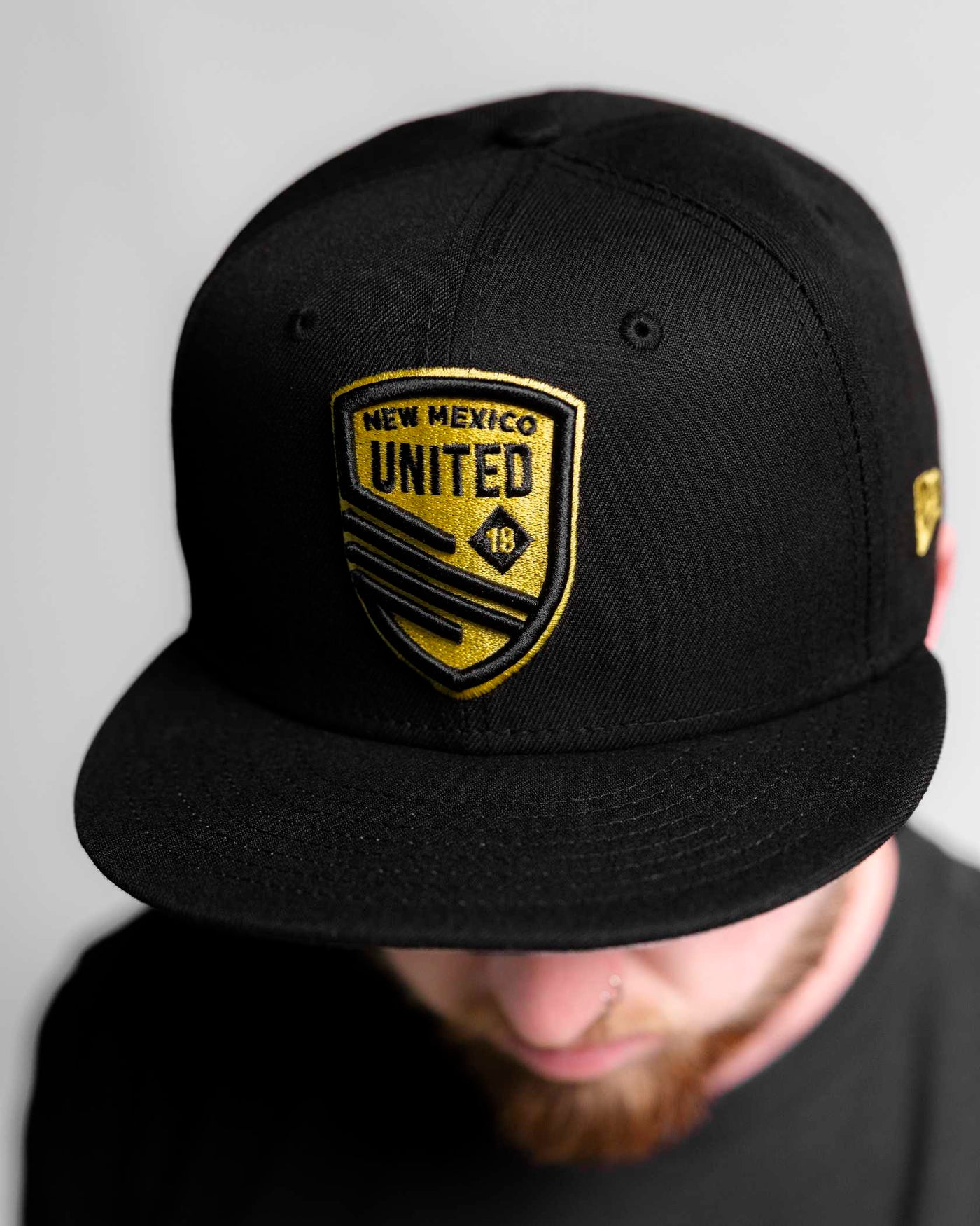 Classic Shield NE Snapback Hat