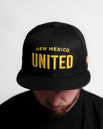 United Wordmark NE Snapback Hat