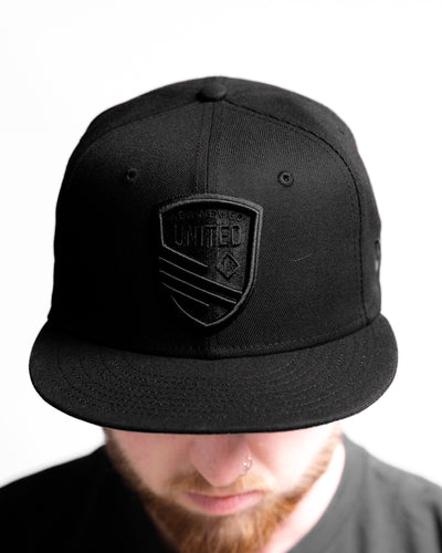 Blackout Shield NE Snapback Hat