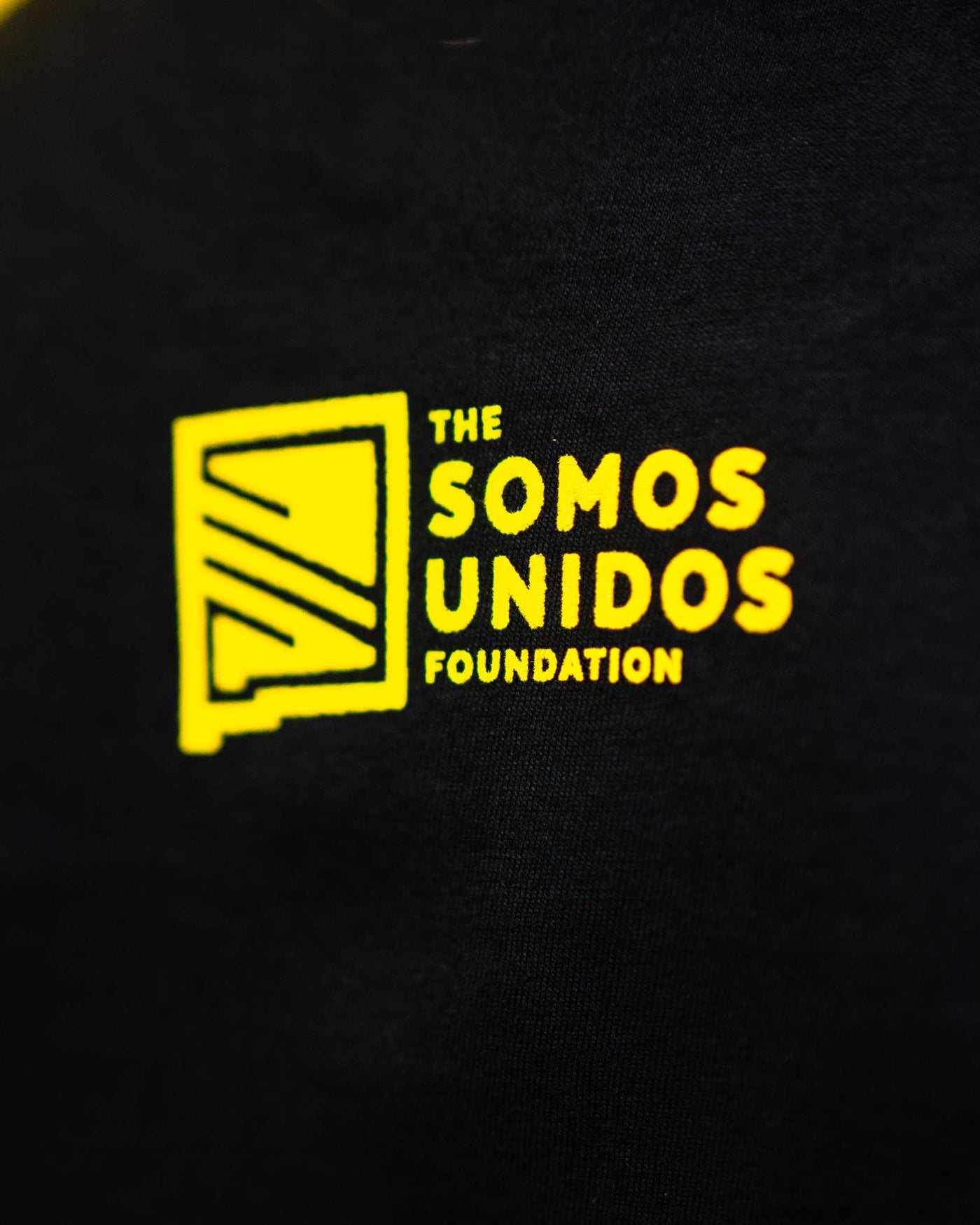 Somos Unidos Foundation Youth Cutout Tee