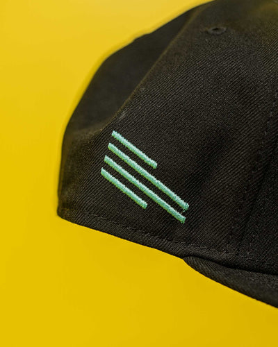 Turquoise Shield NE 59Fifty Fitted Hat